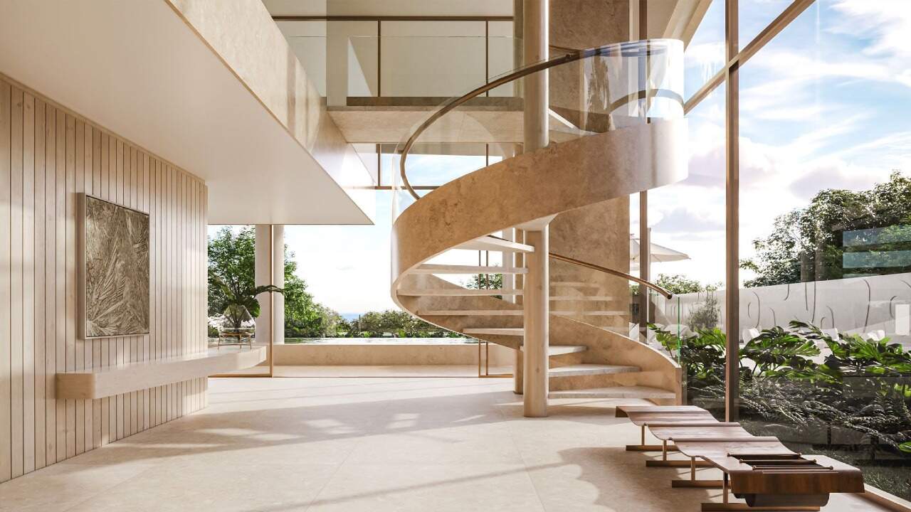 Apartamento diferenciado à venda no Praia Brava: Hall social com escada helicoidal e vista para o jardim (imagem ilustrativa)