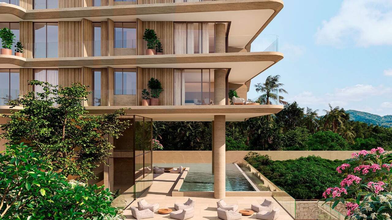 Apartamento diferenciado à venda no Praia Brava: Térreo da torre com jardins, piscina e espreguiçadeiras (imagem ilustrativa)