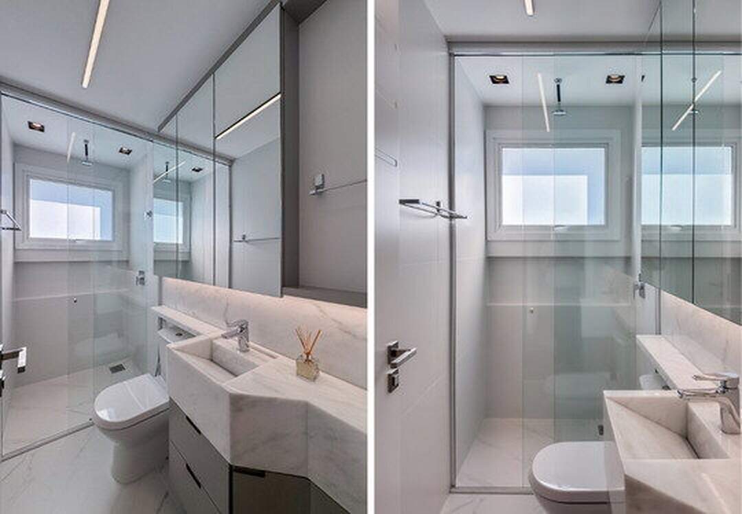 Apartamento à venda no Pioneiros: Banheiro de suíte com bancada de mármore e box de vidro