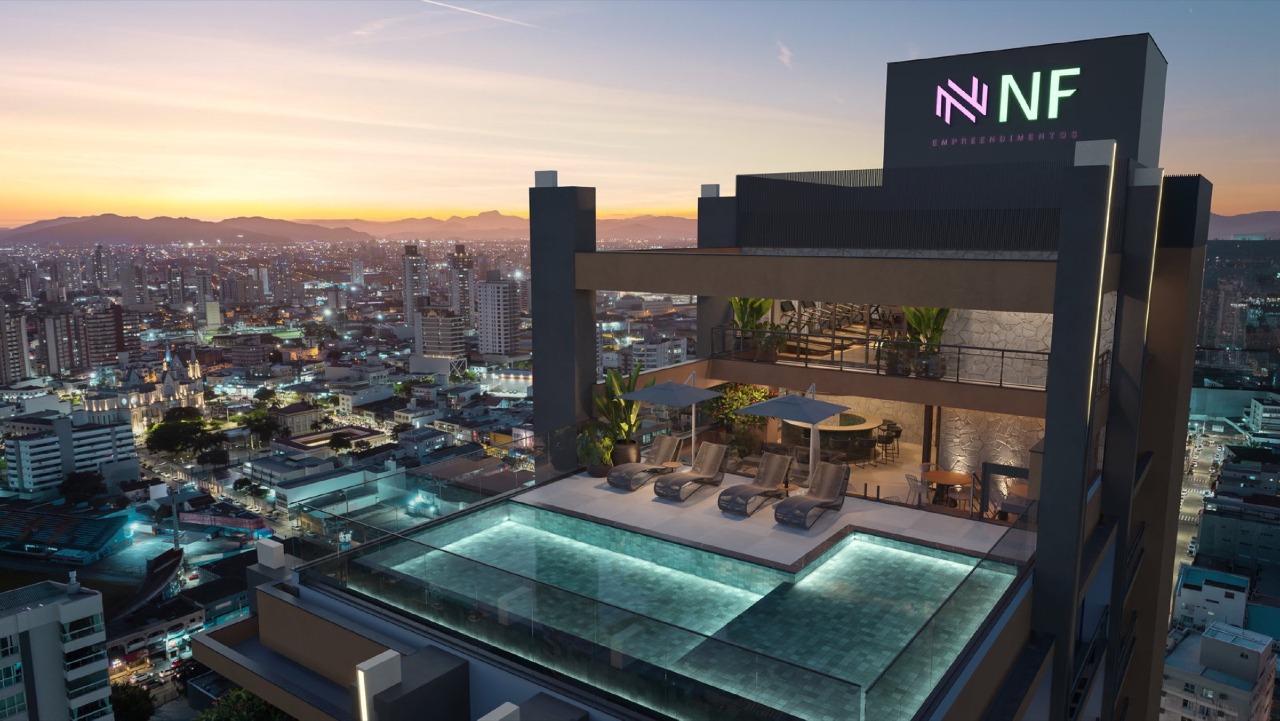 Apartamento diferenciado à venda no Centro: Rooftop do NF Pulse à noite, com piscina, deck e skybar (imagem ilustrativa)