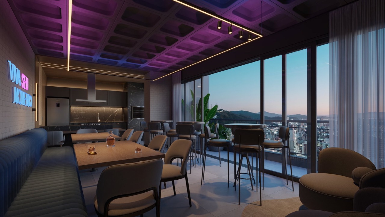 Apartamento diferenciado à venda no Centro: Pub do rooftop do NF Pulse, com mesas junto às janelas (imagem ilustrativa)