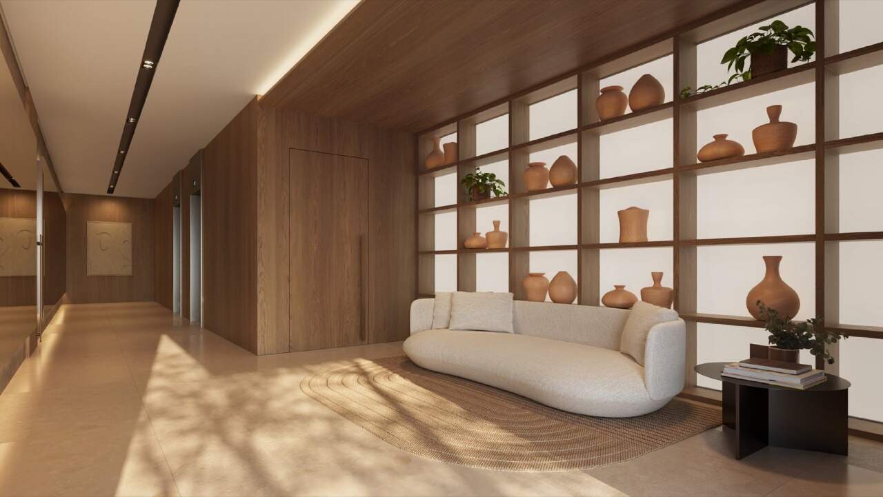 Apartamento à venda no Centro: Hall social de entrada com sofá e estante decorada (imagem ilustrativa)