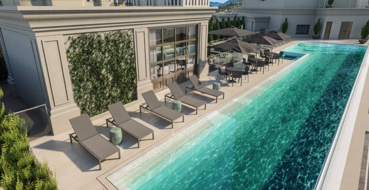 Apartamento à venda no Pioneiros: Piscina com raia de 24 m e espreguiçadeiras no lazer (imagem ilustrativa)