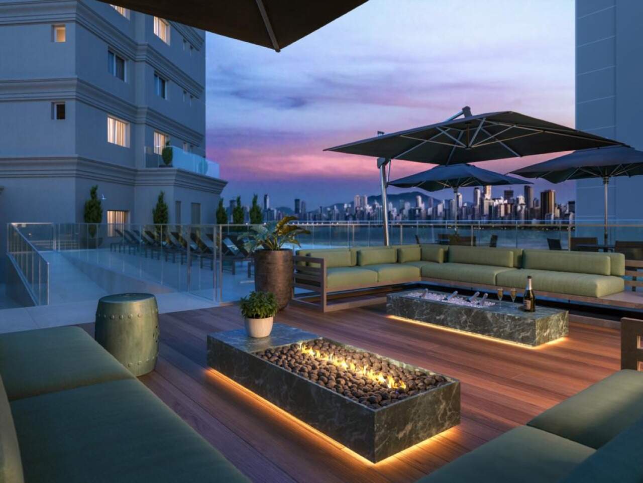 Apartamento à venda no Pioneiros: Outdoor lounge com mesa de fogo e vista para a orla ao entardecer (imagem ilustrativa)
