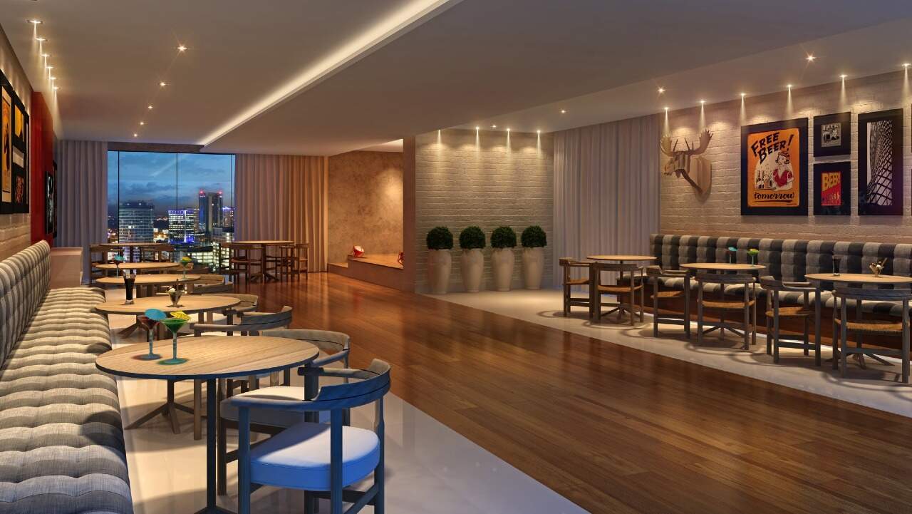 Apartamento à venda no Barra Sul: Pub com mesas, sofás e bar (imagem ilustrativa)