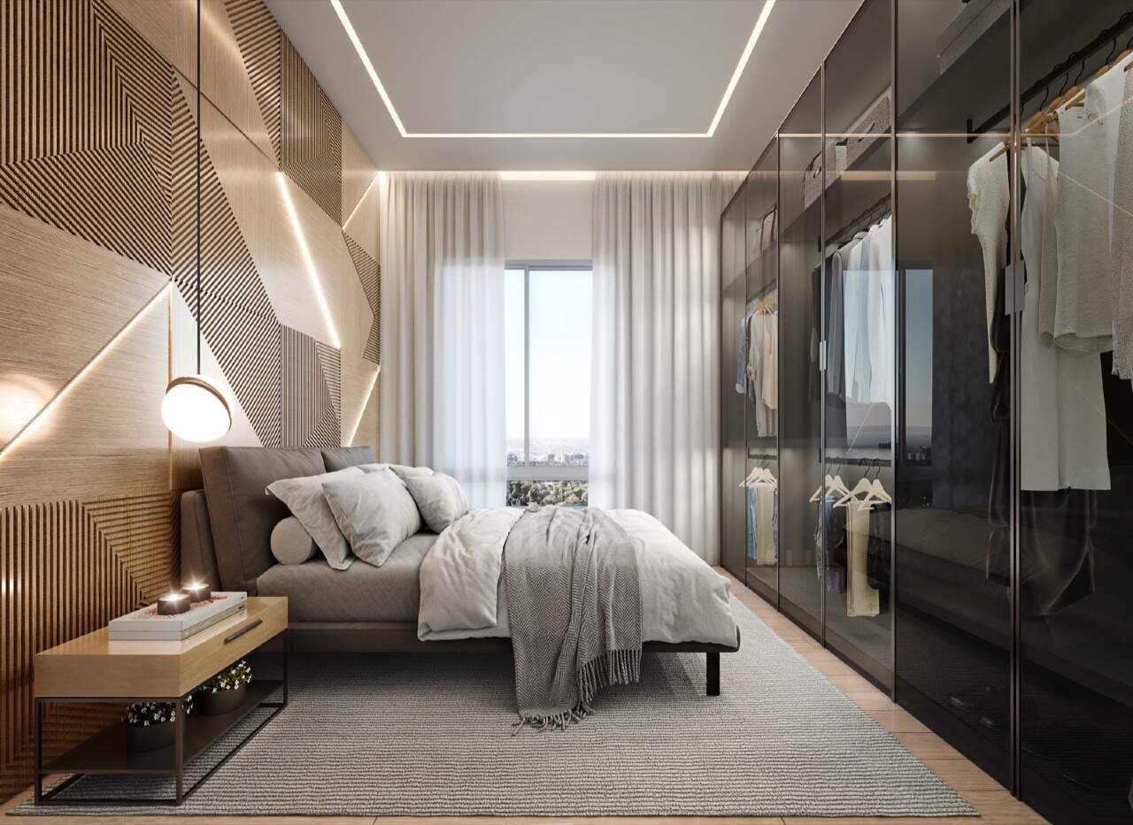 Apartamento à venda no Centro: Suíte decorada com painel de madeira, cabeceira e armário de vidro (imagem ilustrativa)