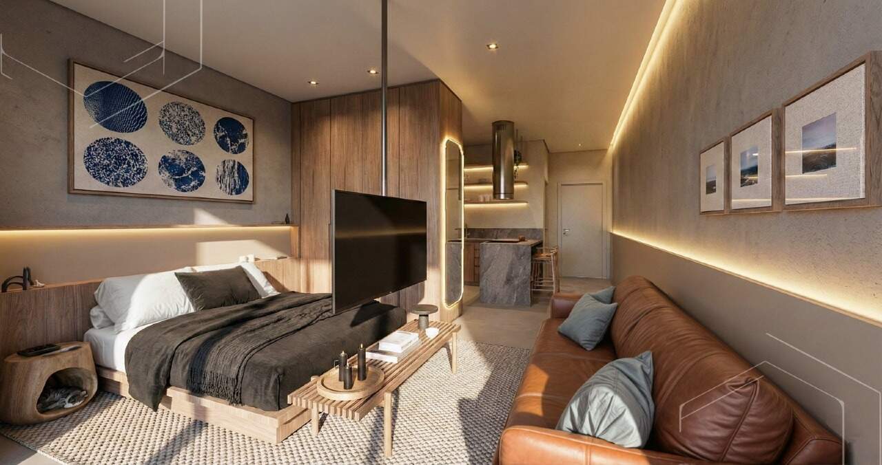 Apartamento à venda no Fazenda: Studio decorado do West Line, da faixa de 35 m², com cama e sofá (imagem ilustrativa)