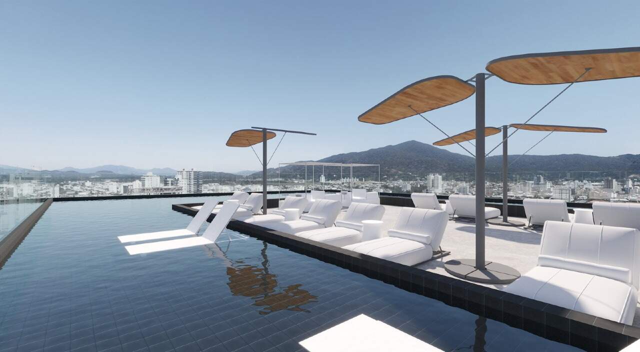Apartamento à venda no Fazendinha: Piscina com guarda-sóis e espreguiçadeiras (imagem ilustrativa)