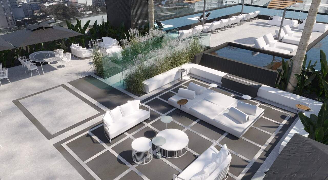 Apartamento à venda no Fazendinha: Deck com lounge e jardim junto à piscina (imagem ilustrativa)