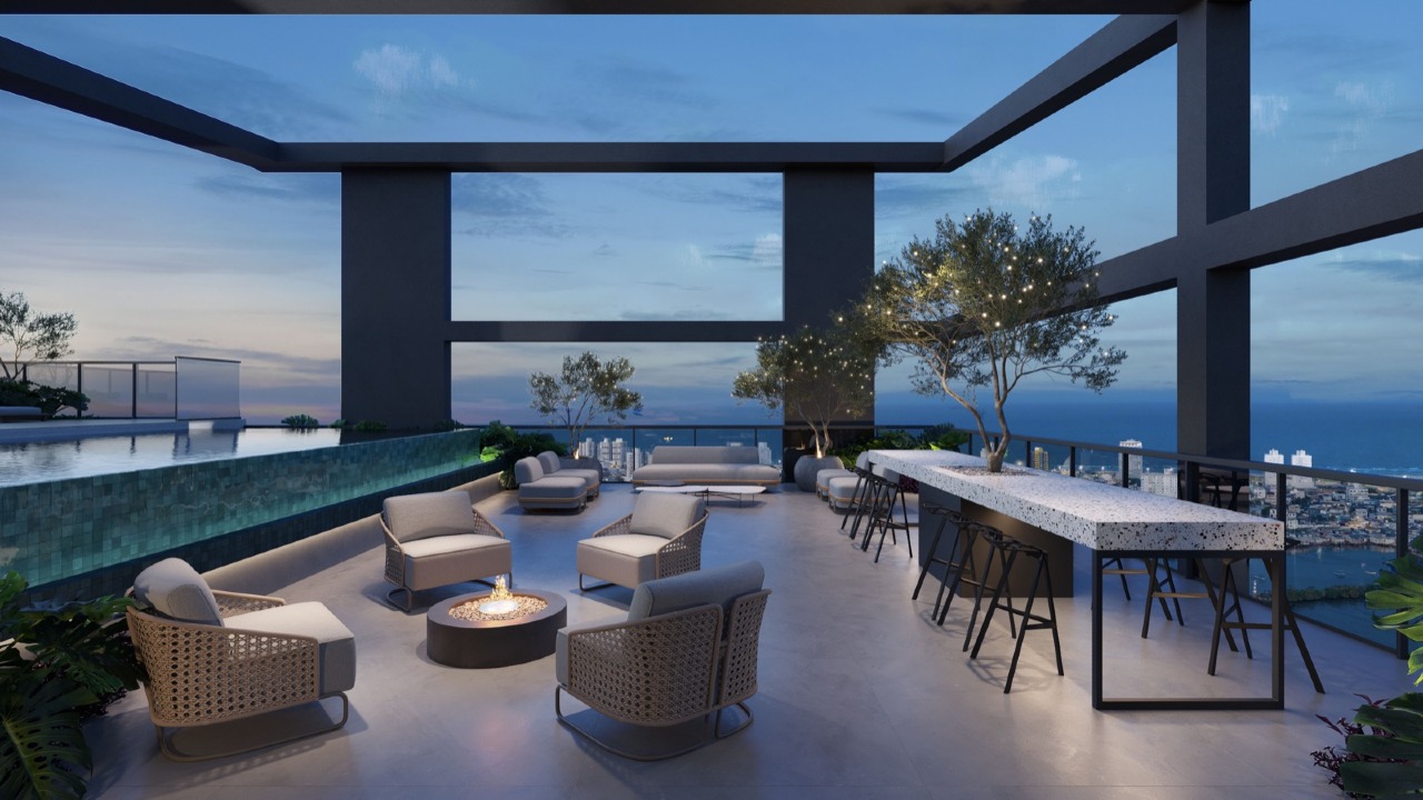 Apartamento à venda no Centro: Lounge externo com lareira e mesa comunitária (imagem ilustrativa)