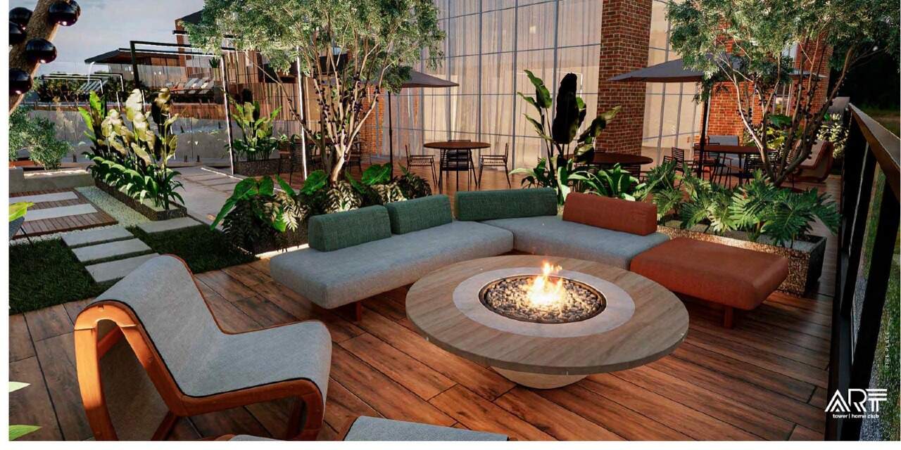 Apartamento à venda no Centro: Fire place com sofás e jardim (imagem ilustrativa)