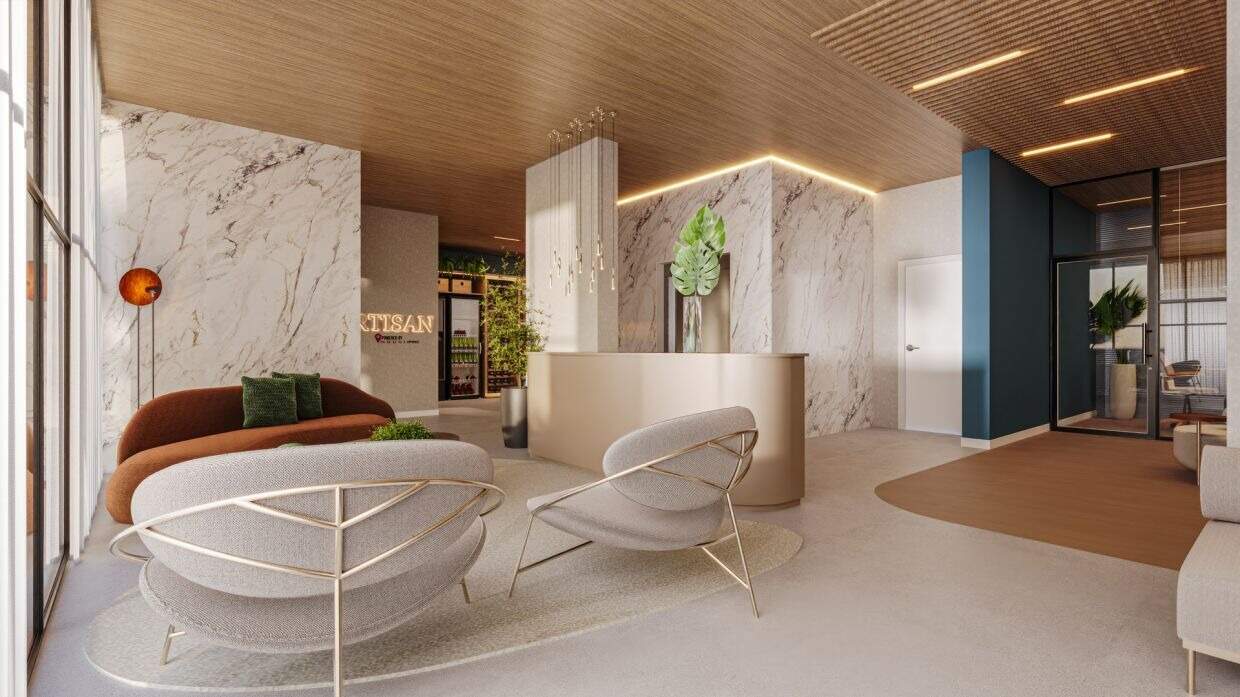 Apartamento à venda no Fazenda: Estar do lobby com poltronas e mesa de centro, ao lado da recepção (imagem ilustrativa)