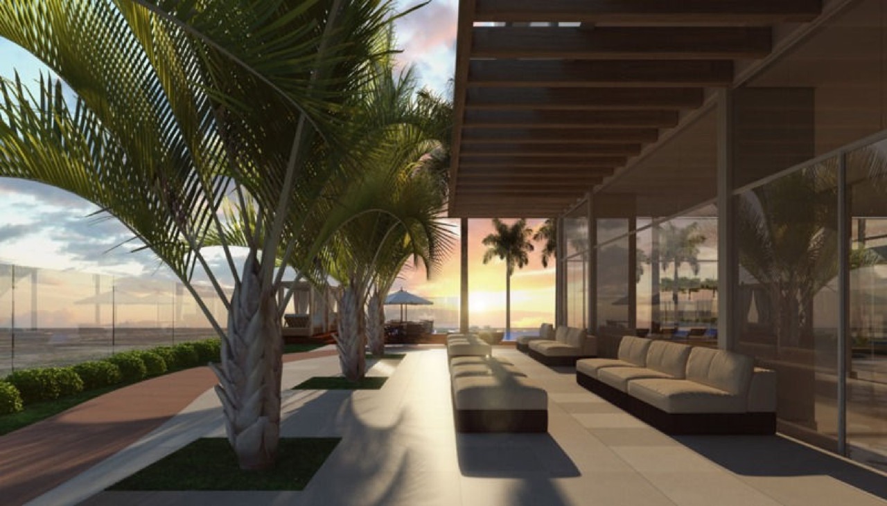 Apartamento à venda no Praia Brava: Lounge externo com sofás e palmeiras ao entardecer (imagem ilustrativa)