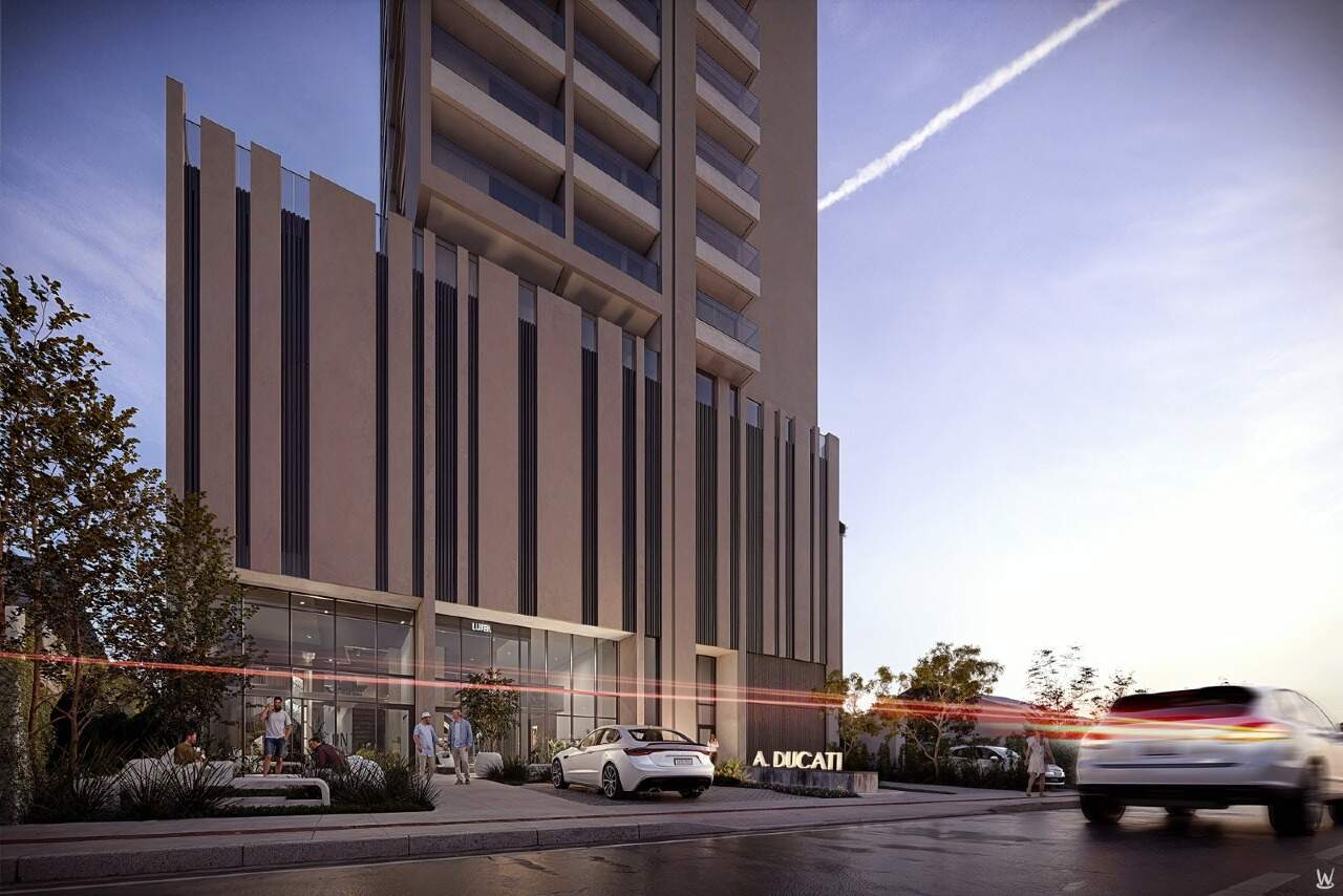 Apartamento à venda no Fazenda: Fachada na Avenida Sete de Setembro, bairro Fazenda, à noite (imagem ilustrativa)