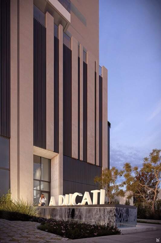 Apartamento à venda no Fazenda: Entrada com o letreiro A. Ducati iluminado (imagem ilustrativa)