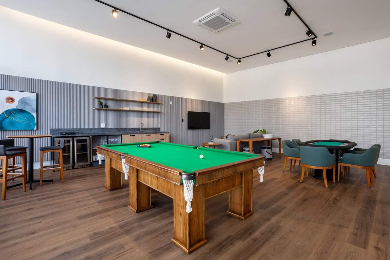 Apartamento diferenciado à venda no Praia Brava: Sala de jogos com mesa de sinuca e mesa de carteado
