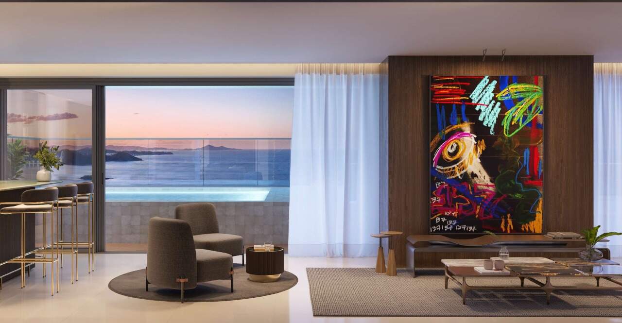 Cobertura à venda no Centro: Living da penthouse aberto para a varanda com piscina e vista para o mar (imagem ilustrativa)