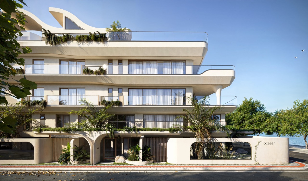 Apartamento diferenciado à venda no Cabeçudas: Fachada lateral do Oceean, com a Praia de Cabeçudas à direita (imagem ilustrativa)