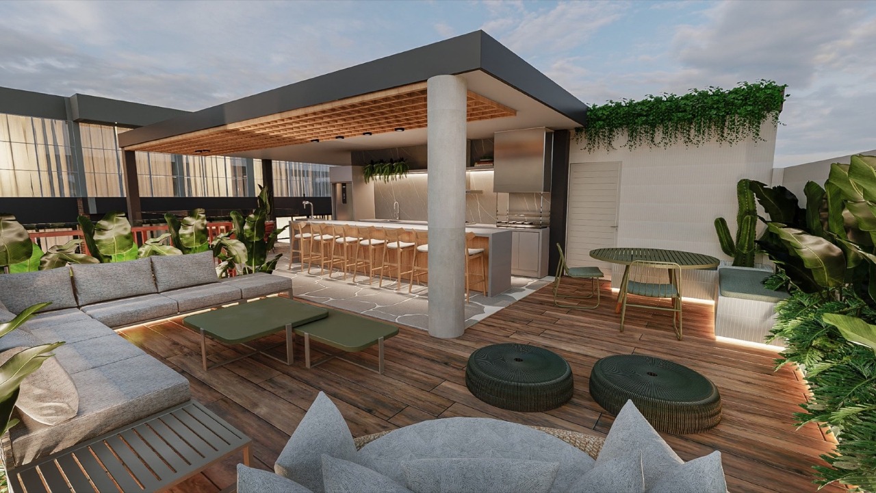 Apartamento à venda no Centro: Lounge ao ar livre com sofás e bar (imagem ilustrativa)