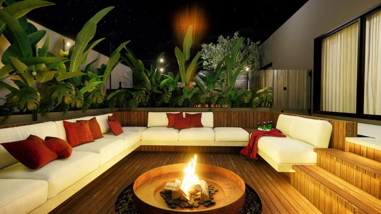 Apartamento à venda no Centro: Fireplace com sofás em volta da lareira externa (imagem ilustrativa)