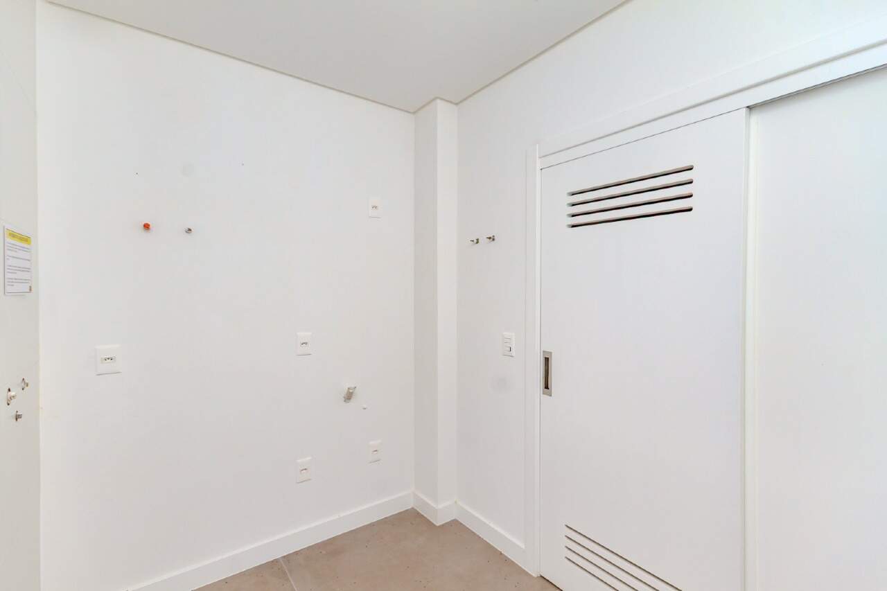 Apartamento à venda no Centro: Lavanderia com espaço para máquina