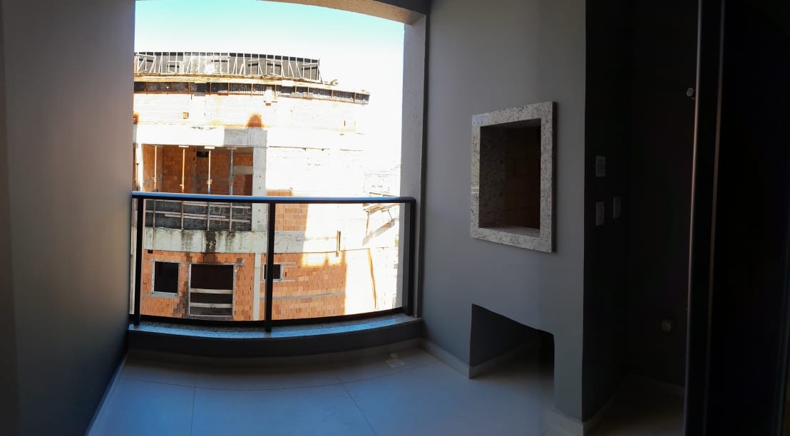 Apartamento à venda no Centro: Sacada com churrasqueira