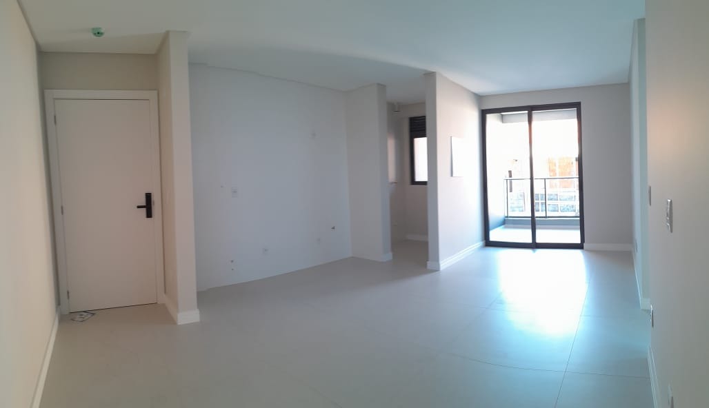 Apartamento à venda no Centro: Living e circulação com luz natural