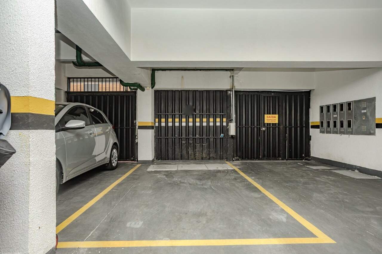 Apartamento à venda no Centro: Vaga de garagem demarcada
