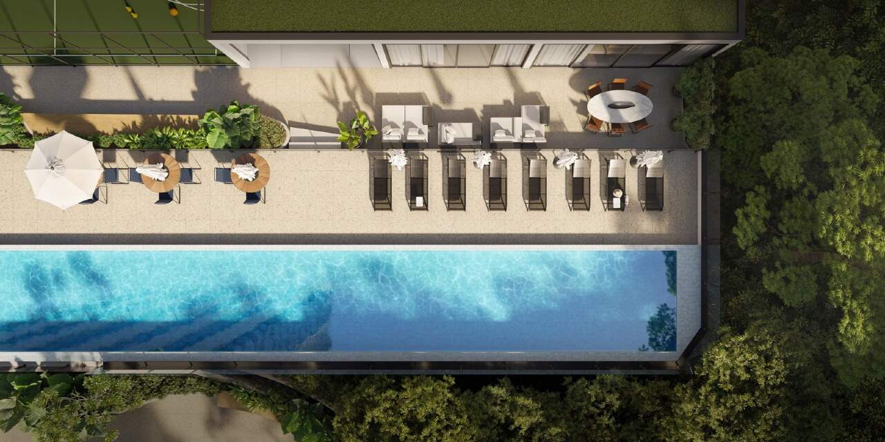 Apartamento à venda no Pioneiros: Piscina com espreguiçadeiras (imagem ilustrativa)