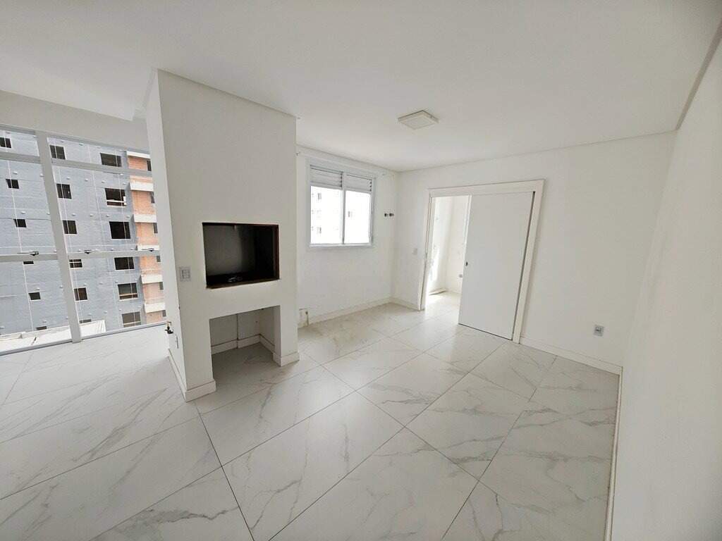 Apartamento à venda no Centro: Sala com painel para TV