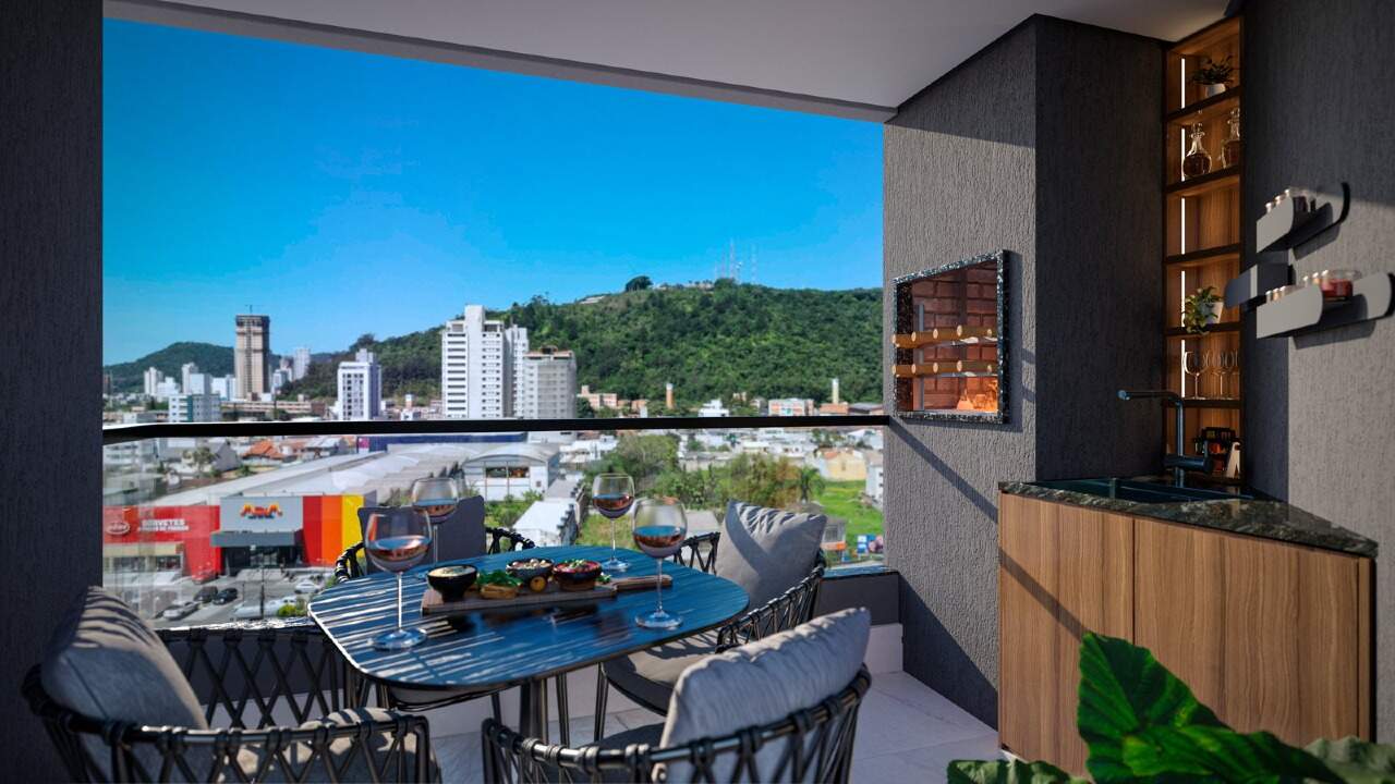 Apartamento à venda no Centro: Sacada com churrasqueira e vista da cidade (imagem ilustrativa)
