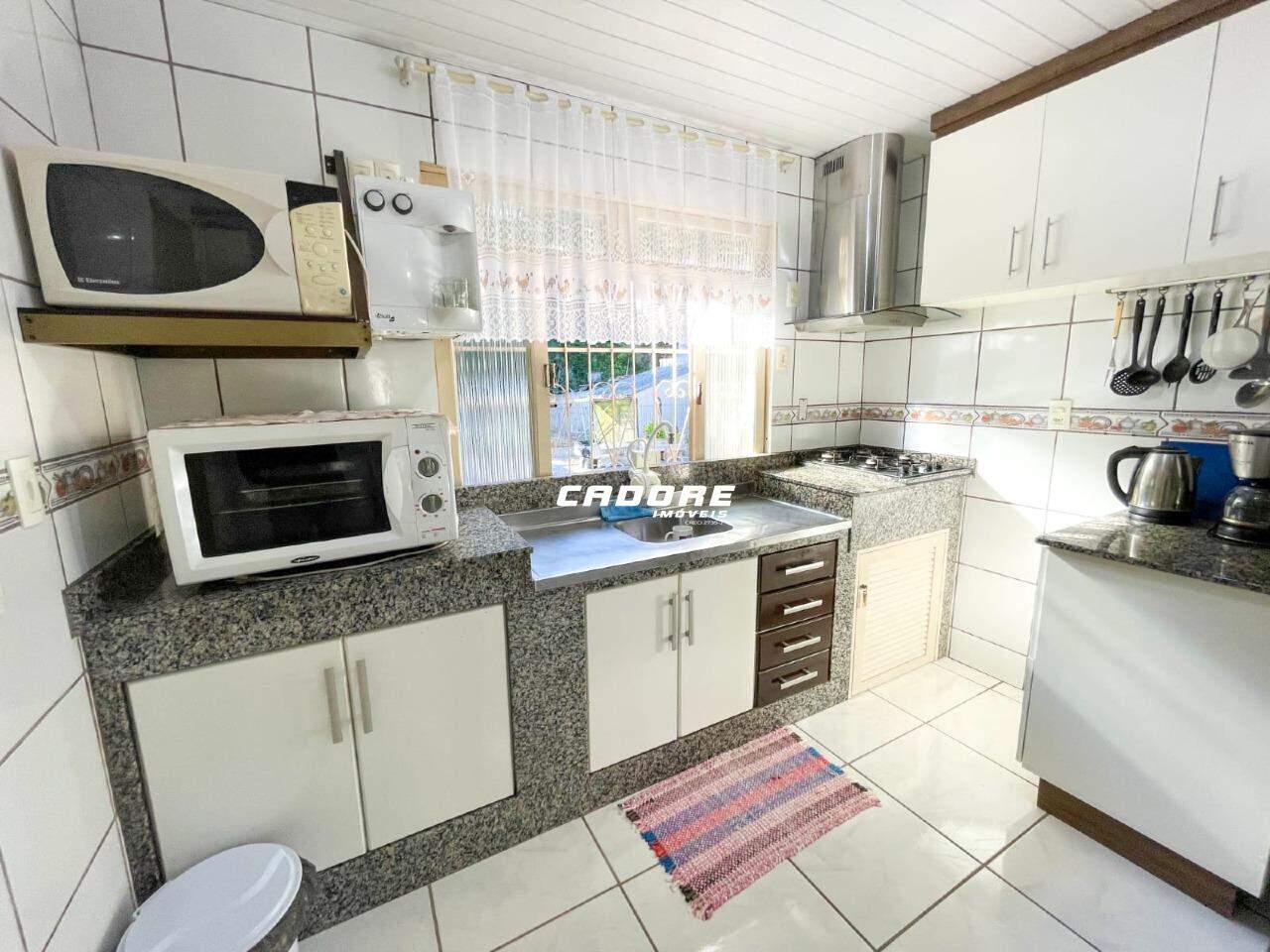 Casa ampla com 4 quartos e terreno espaçoso no bairro Progresso I Cadore Imóveis — foto 4