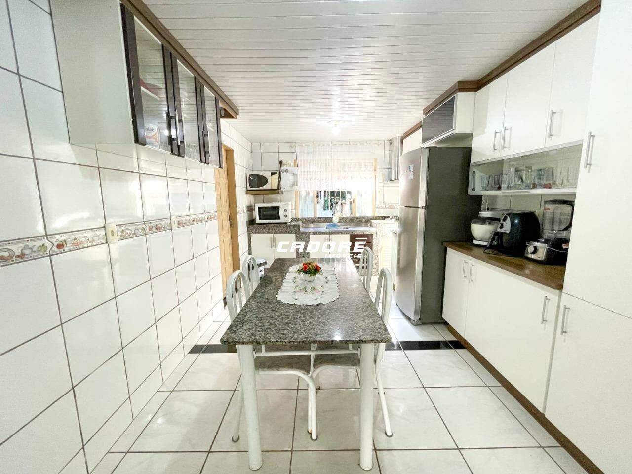Casa ampla com 4 quartos e terreno espaçoso no bairro Progresso I Cadore Imóveis — foto 2