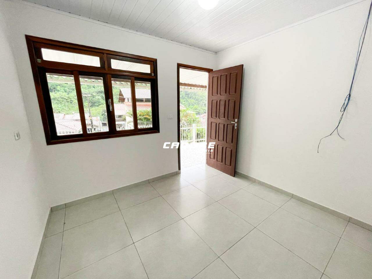 Casa com 3 dormitórios e área com churrasqueira para locação no bairro Porgresso I Cadore Imóveis — foto 4