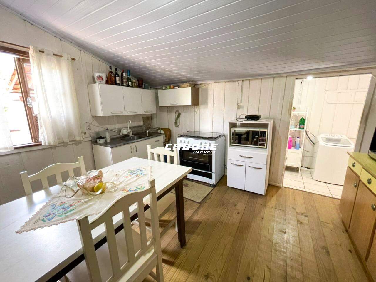 Casa com 4 dormitórios para venda no bairro Progresso I Cadore Imóveis — foto 6