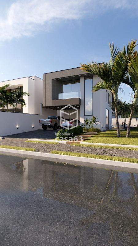 Foto 2 — Sobrado individual com 4 suítes, (sendo 1 das suítes térrea) com área de lazer.