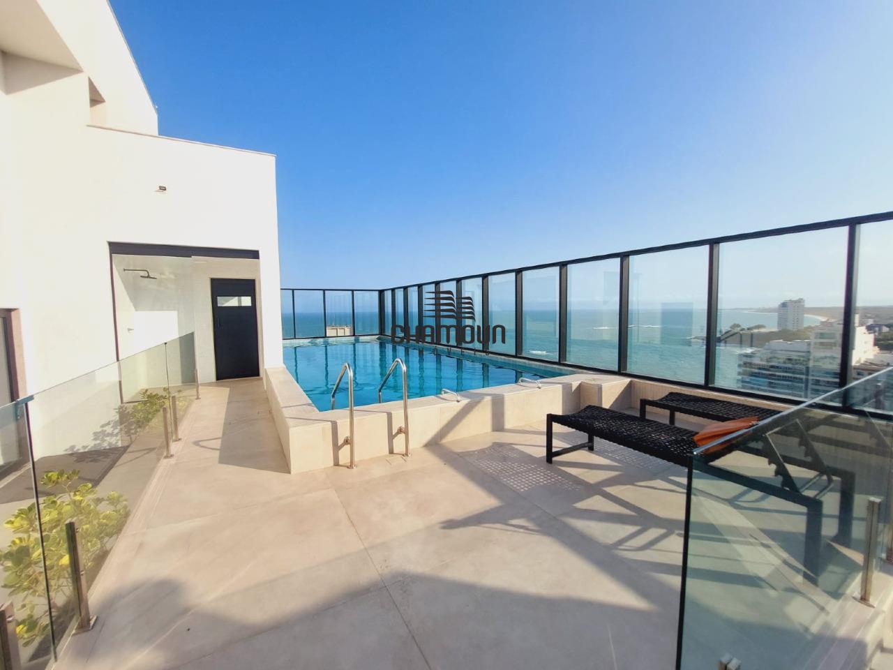 Apartamento à venda no Praia do Morro: 3 quartos, sendo 3 suites, 1 lavabo, 2 vagas de garagem.