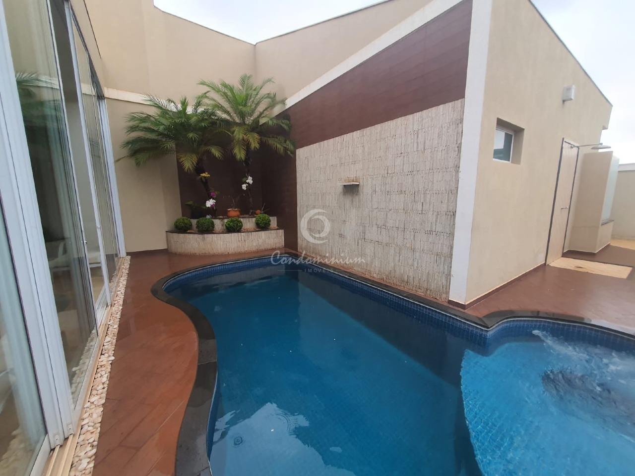 Casa de Condomínio com 4 quartos à venda, 323m² — foto 1 de 57