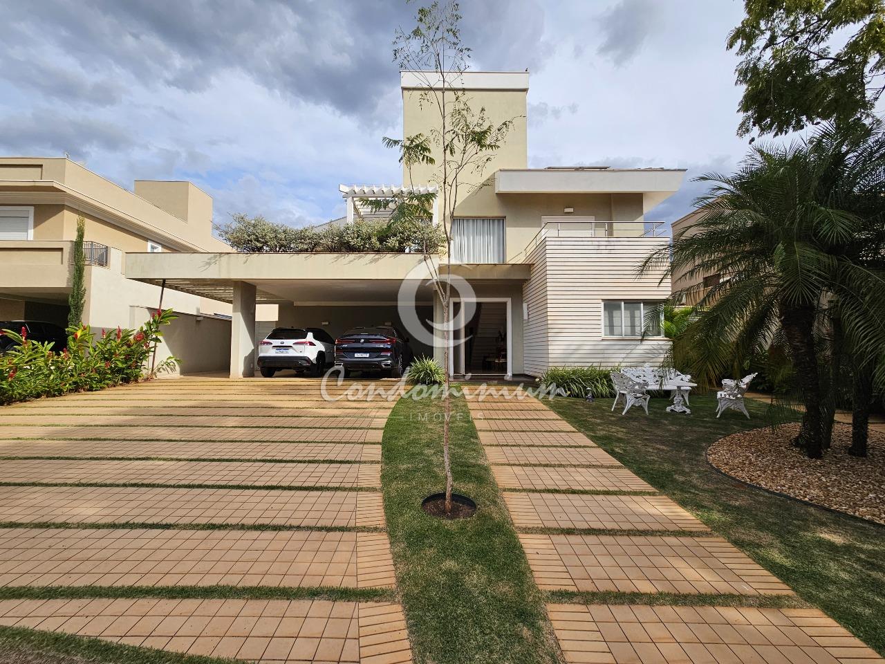 Casa de Condomínio com 4 quartos à venda, 377m² — foto 1 de 40