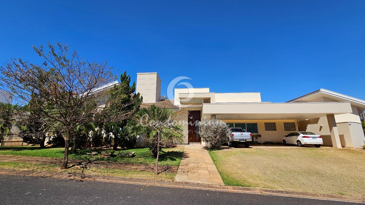 Casa de Condomínio com 4 quartos à venda, 459m² — foto 1 de 37