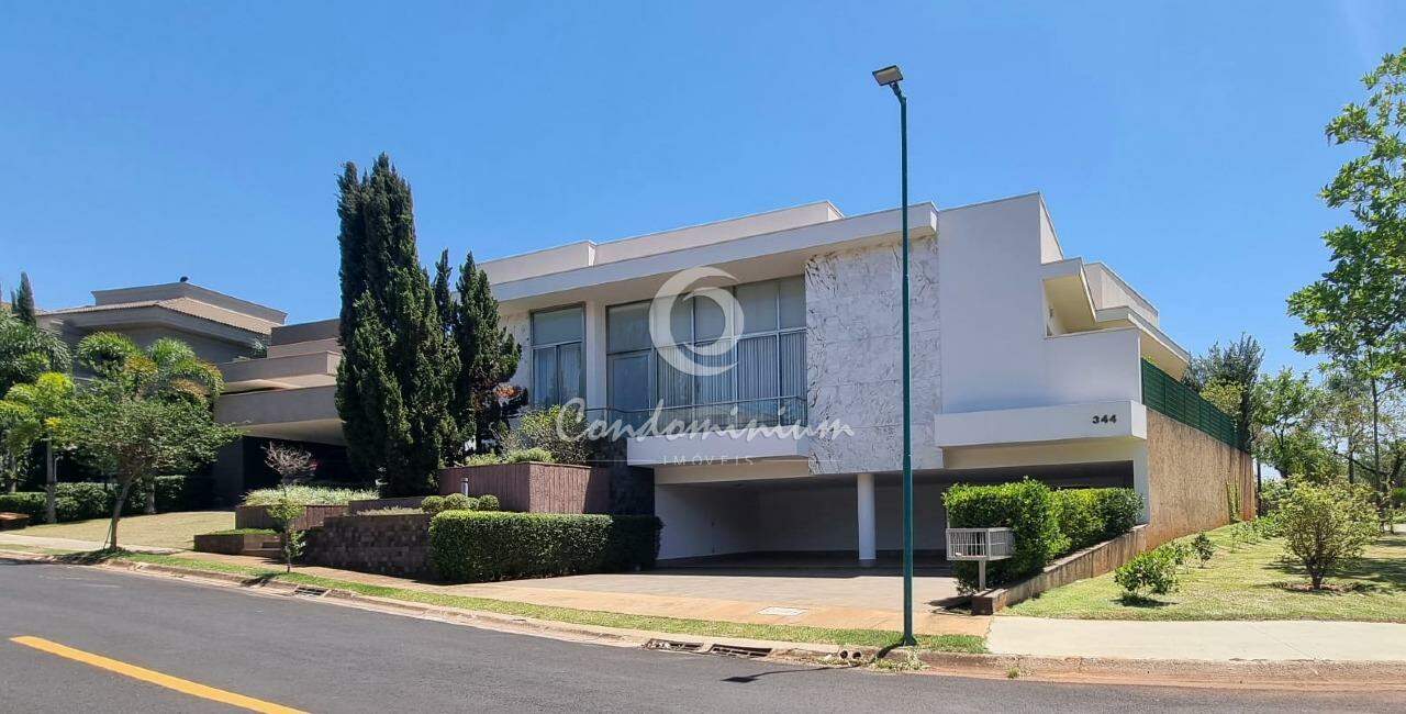 Casa de Condomínio com 4 quartos à venda, 475m² — foto 1 de 55