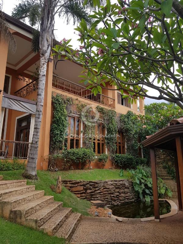 Casa de Condomínio com 5 quartos à venda, 676m² — foto 1 de 44