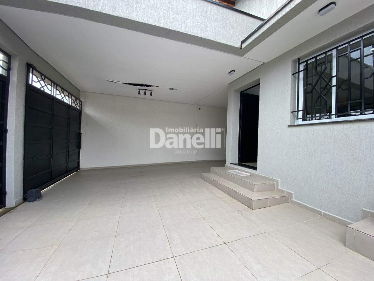 Casa à venda no Jardim Independência: garagem lateral