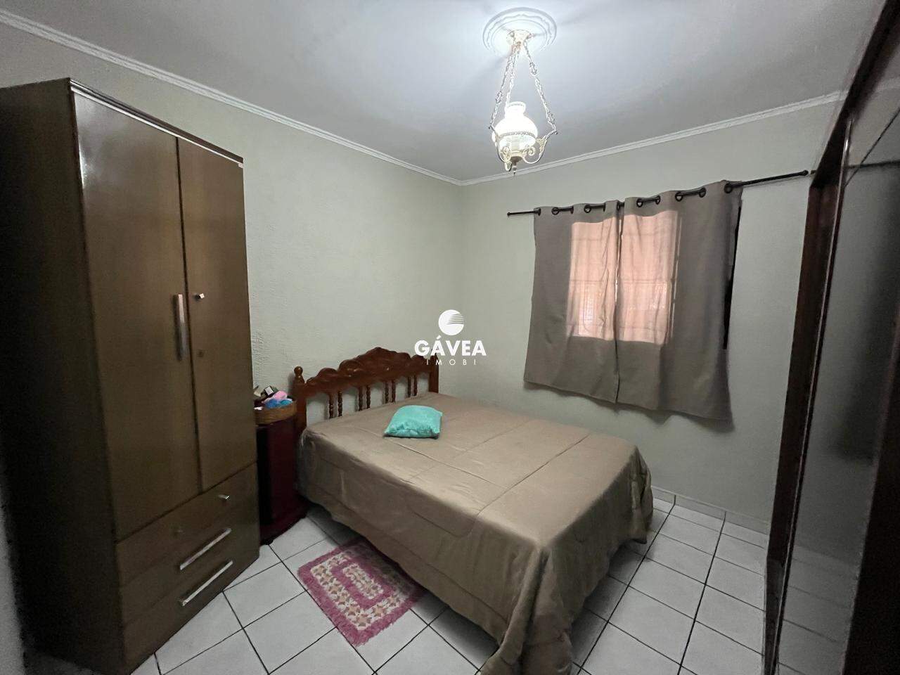 Casa à venda no Cidade Naútica: quarto de frente para garagem