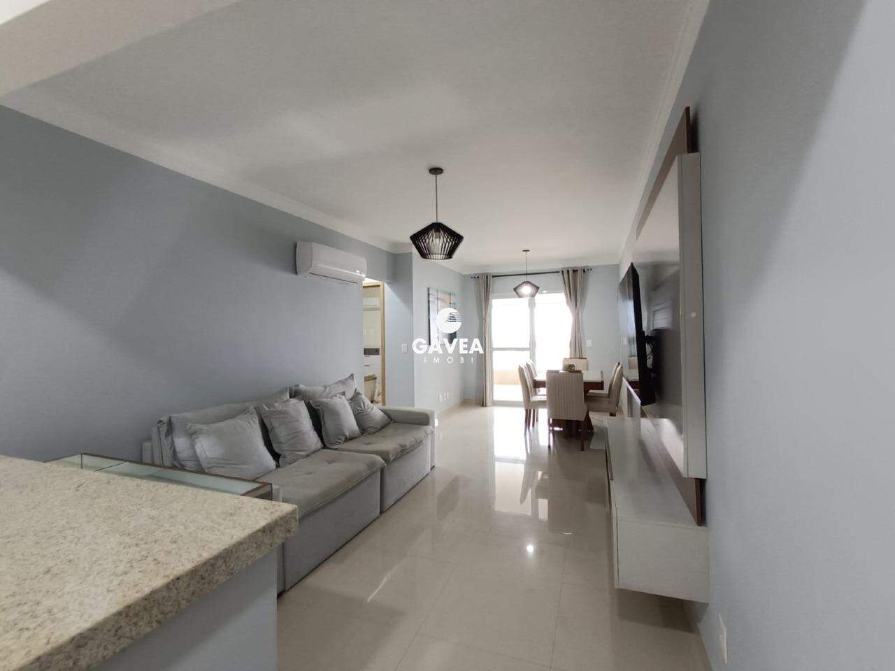 Apartamento à venda no Canto do Forte: sala 2 ambientes com sacada