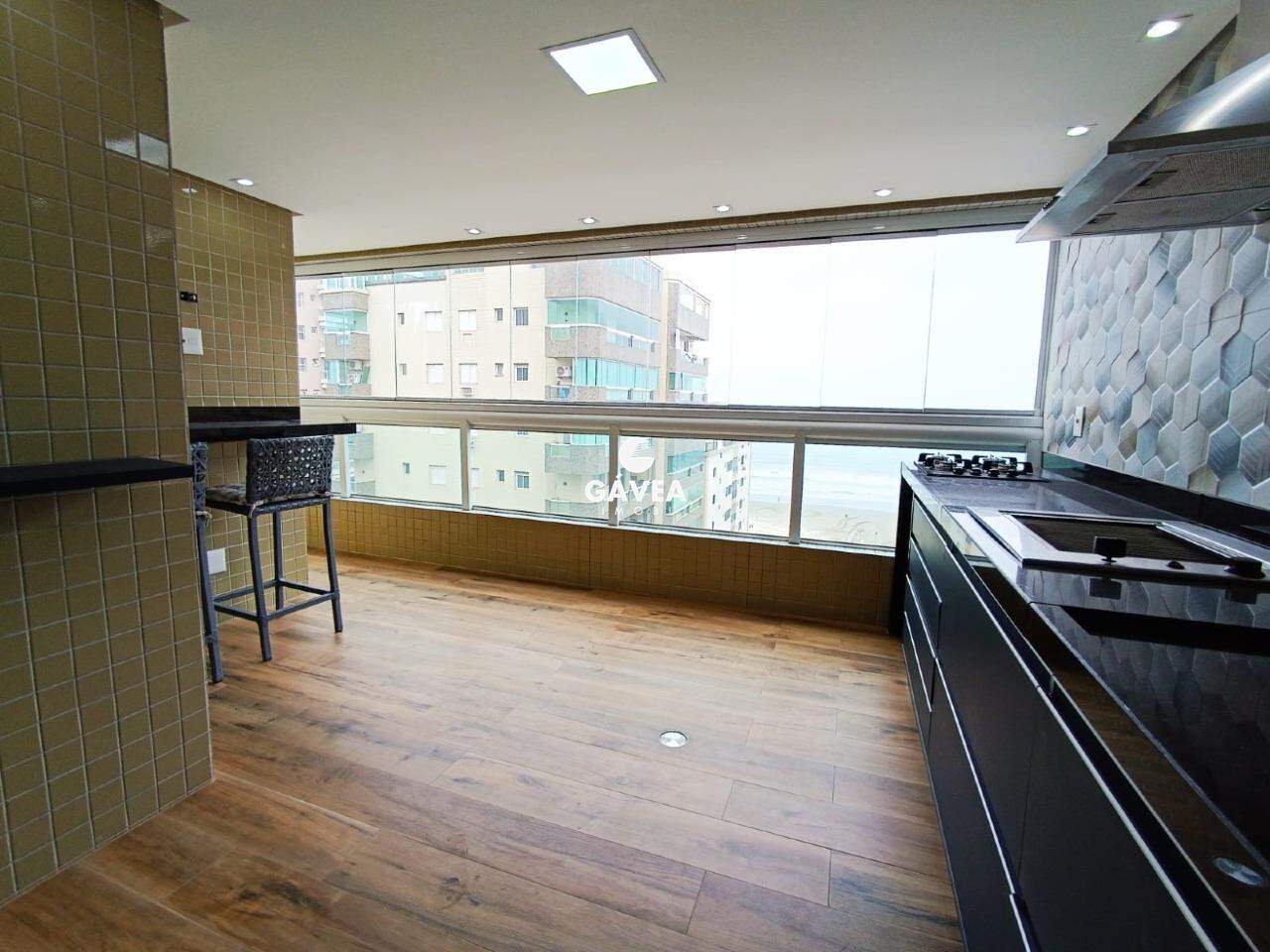 Apartamento à venda no Canto do Forte: sacada gurme 