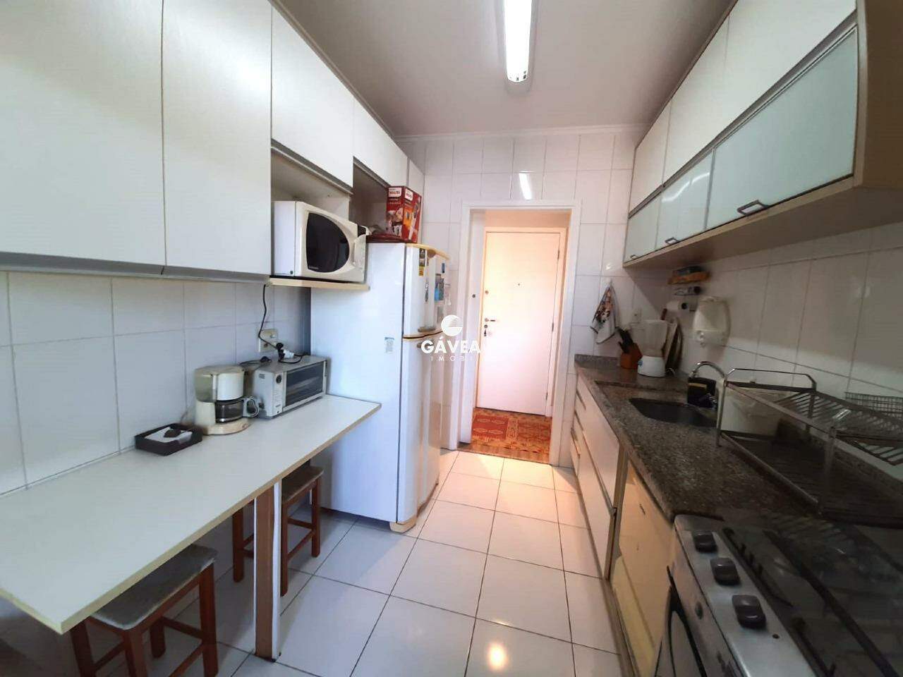 Cobertura à venda no Ponta da Praia: cozinha