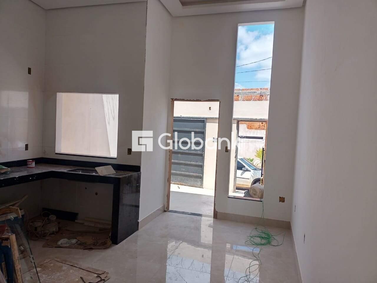 Casa 2 quartos à venda Interlagos 55m² Montes Claros MG: cozinha integrada com a sala de visita