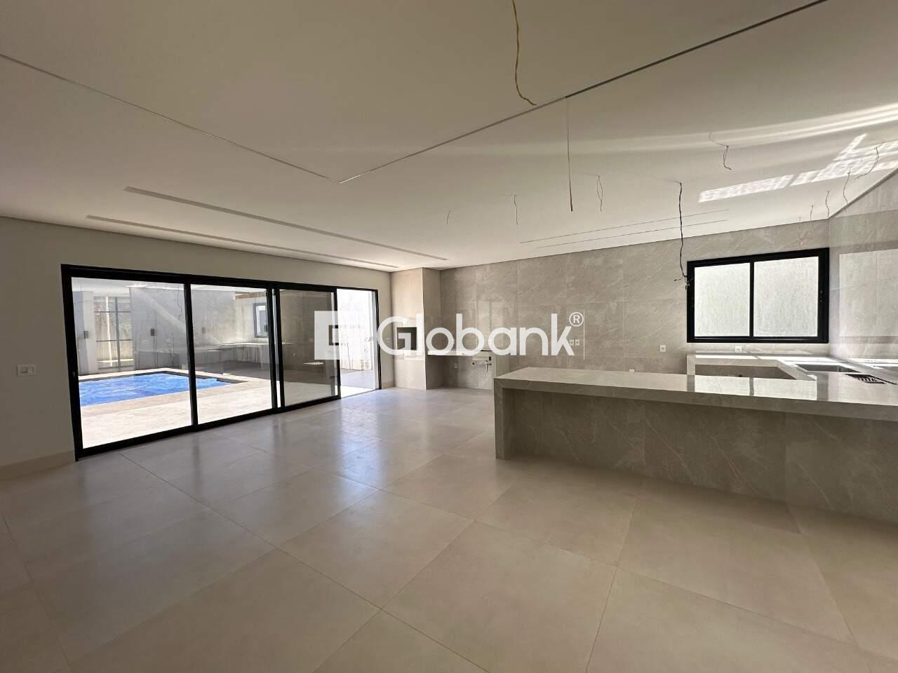 Casa em condomínio 3 quartos à venda Ibituruna 250m² Montes Claros MG: Sala de jantar com cozinha e churrasqueira