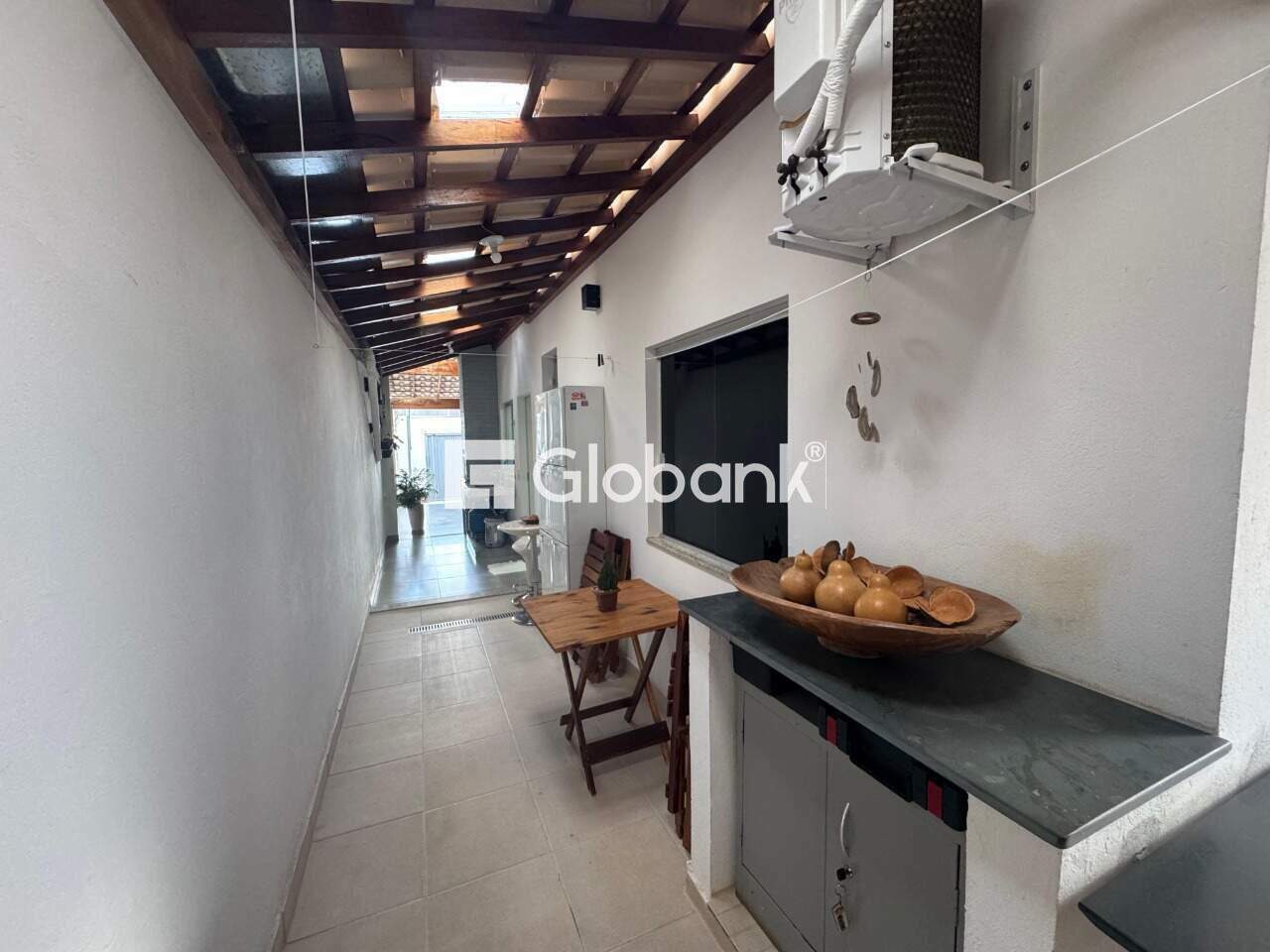 Casa 3 quartos à venda Loteamento Bosque das Palmeiras 90m² Montes Claros MG: Corredor Lateral